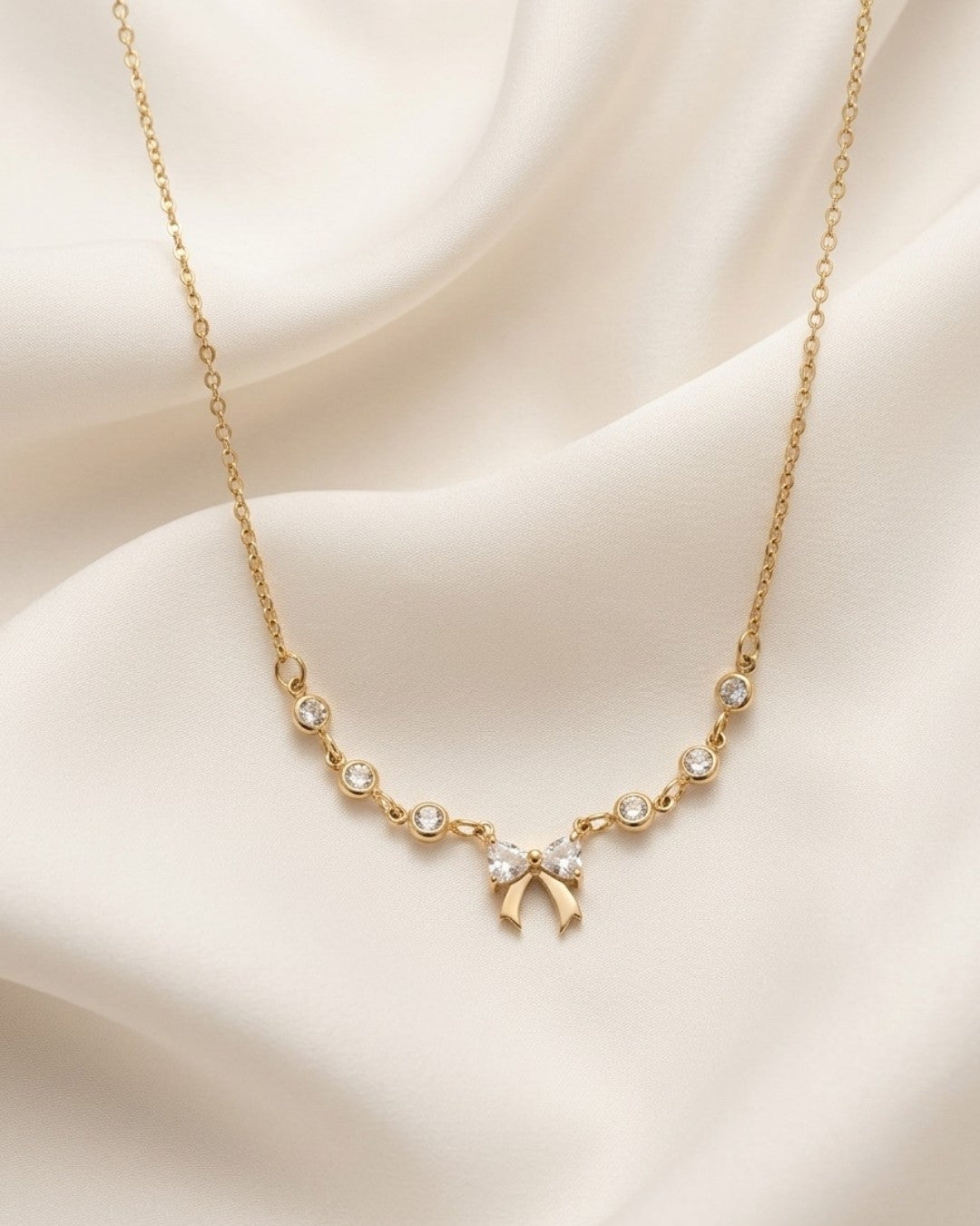 Coquette Crystal Bow Station Gold Plated Necklace