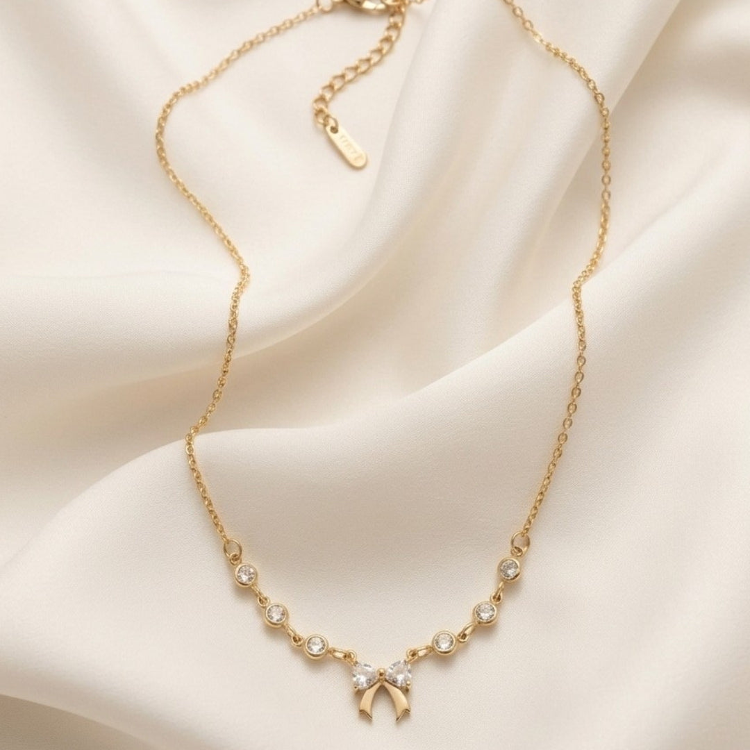 Coquette Crystal Bow Station Gold Plated Necklace