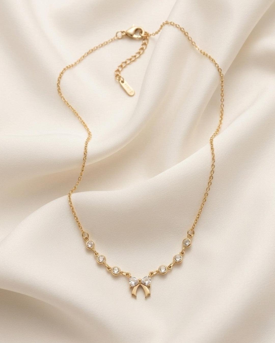Coquette Crystal Bow Station Gold Plated Necklace