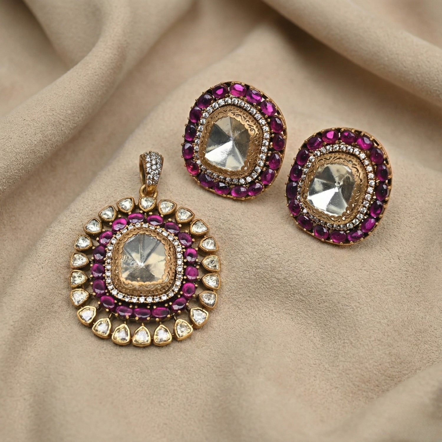 Choco Toned Silver 925 Moissanite pendant and earrings set with purple gemstones on a beige fabric background