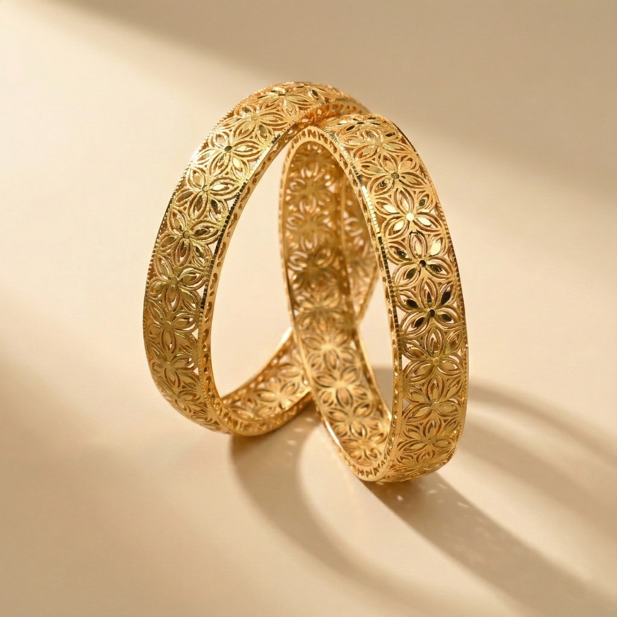 Solverin Repetitive Floral Engraved Bangles in Silver 925 (Gold Polished)