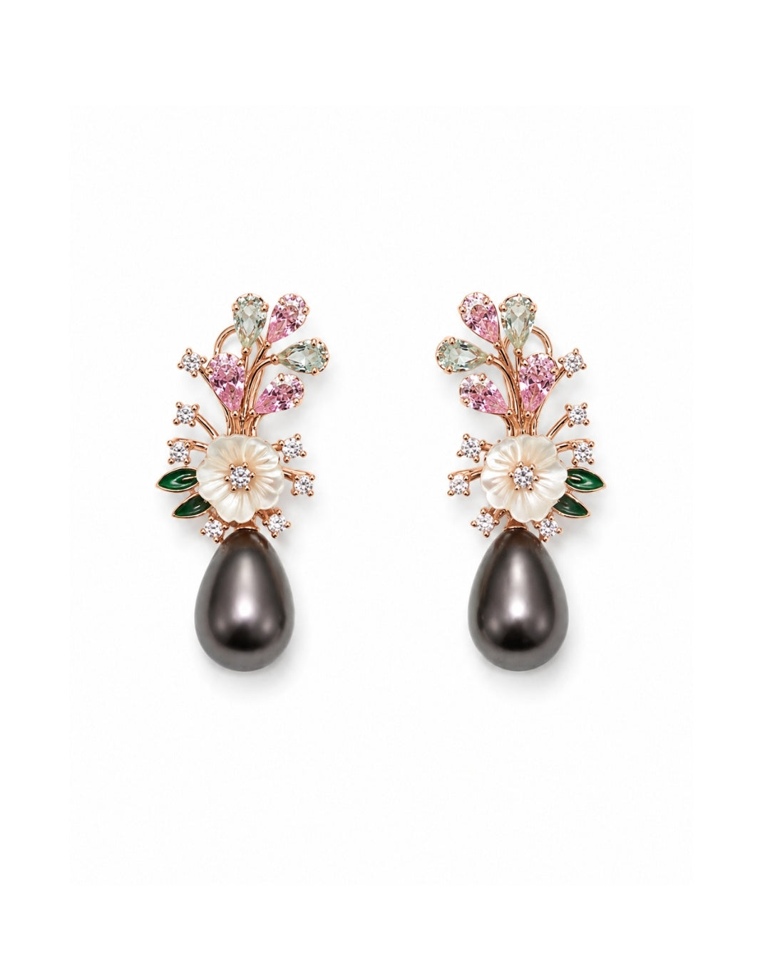 A pair of floral drop silver 925 earrings featuring white mother-of-pearl flowers, pink and green gemstone accents, rose gold metal, and a dangling dark gray teardrop pearl at the bottom, set against a plain white background.