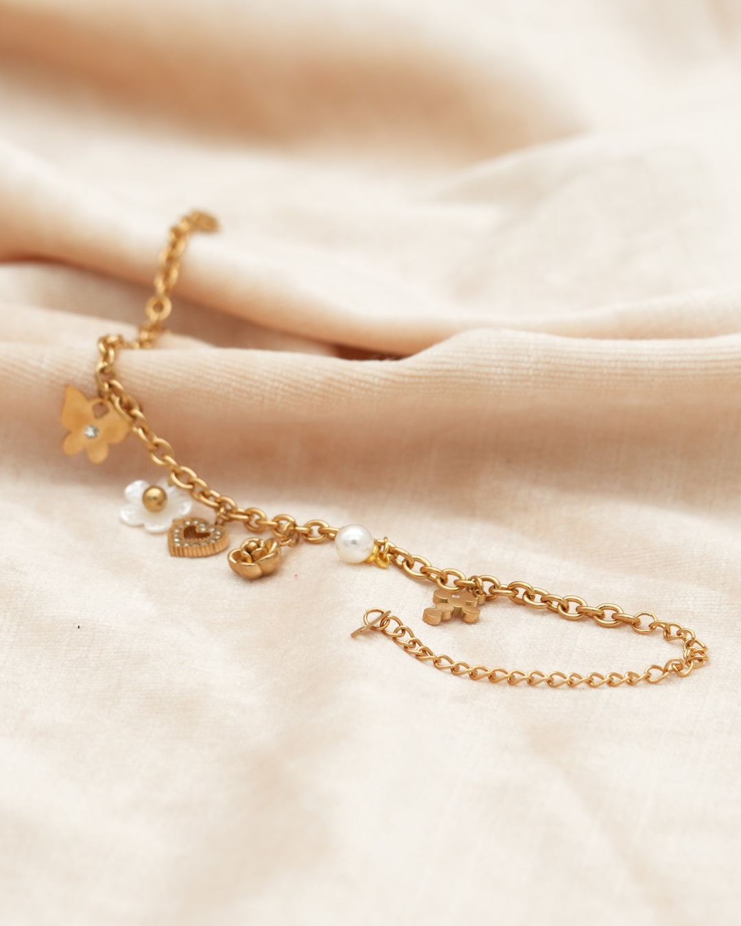 Whimsy Pearl Multi-Charm Gold Bracelet